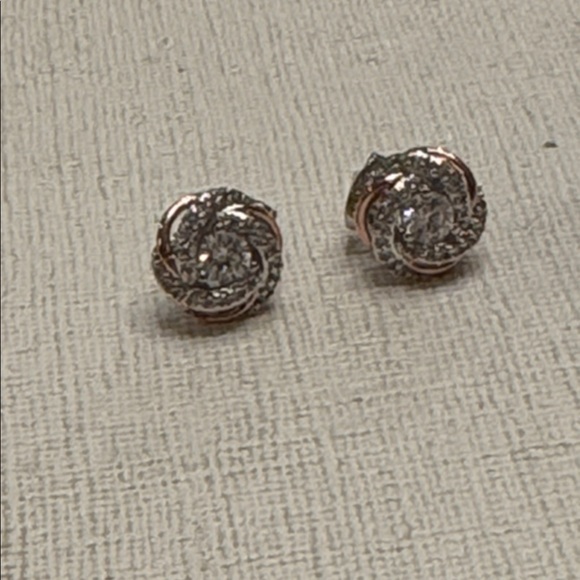 BELLA LUCE White Cubic Zirconia Rhodium 18k
Rose Gold Over Bronze Stud Earrings - Picture 2 of 4